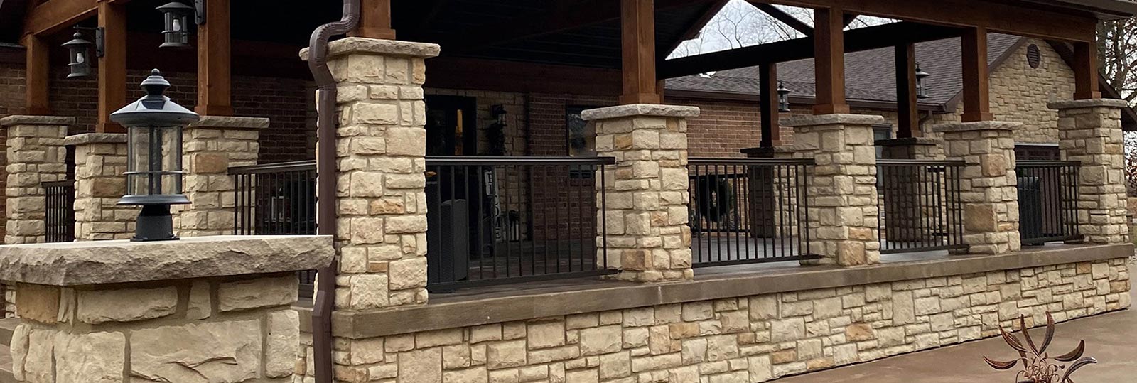 stone columns on a porch of a home